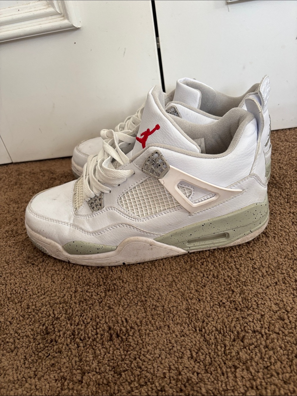 Jordan White Sneakers with Red Jumpman Accent
